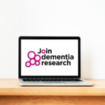 Laptop with the Join Dementia Research logo on the screen